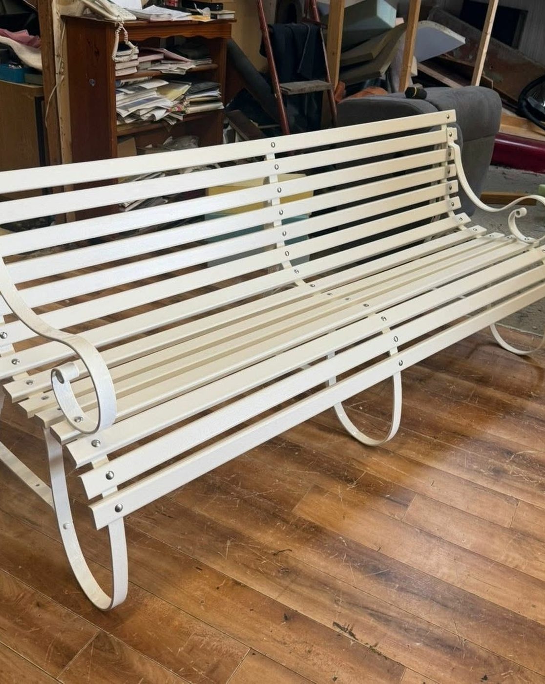 The same bench stripped and refinished in white, in the workshop