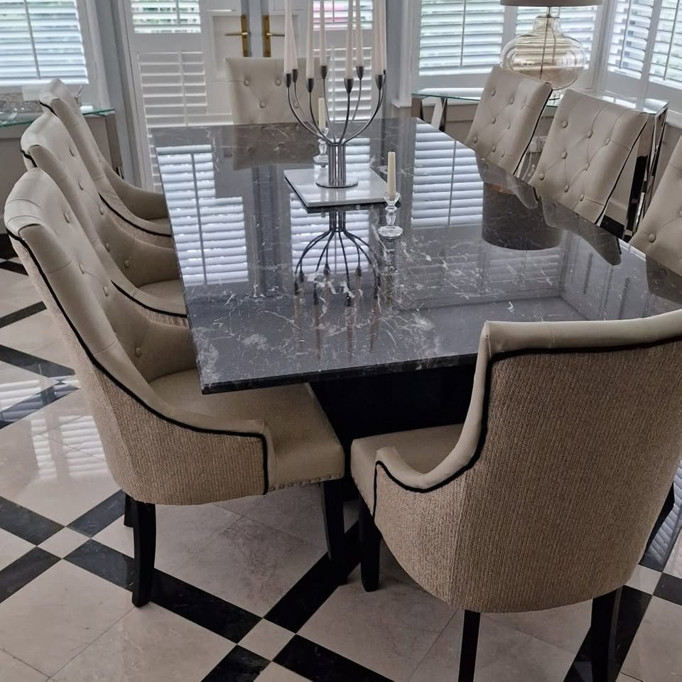 Upholstered dining chairs around a table